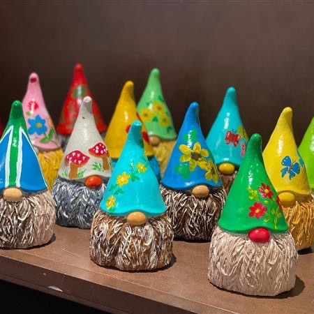 Residents enjoyed painting gnomes with bright colours at Wild Rose senior living