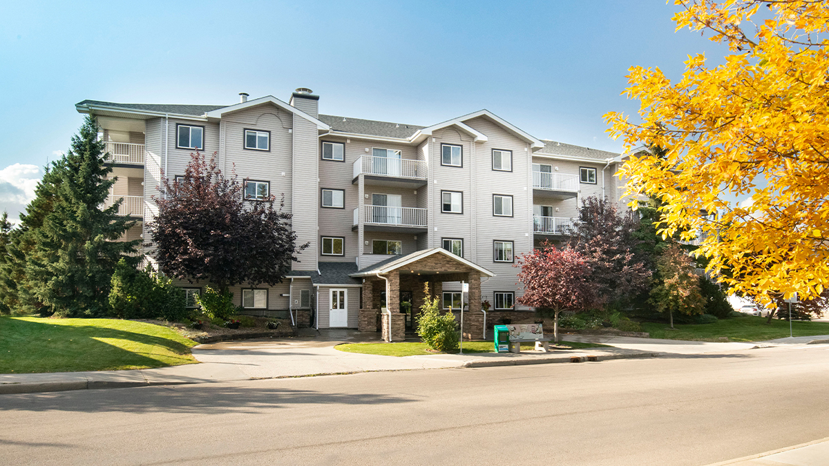 Wild Rose senior living community exterior in fall.