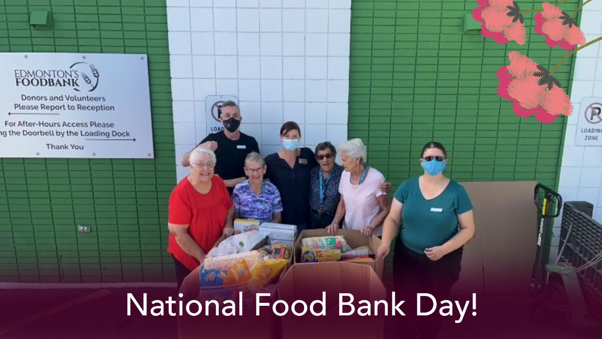 Residents and staff of a seniors home dropping off all of the food collected for the Food Bank.