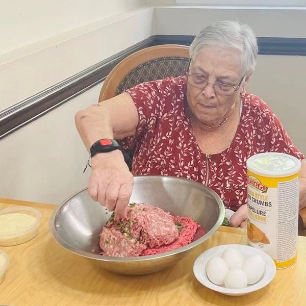 A senior doing some cooking
