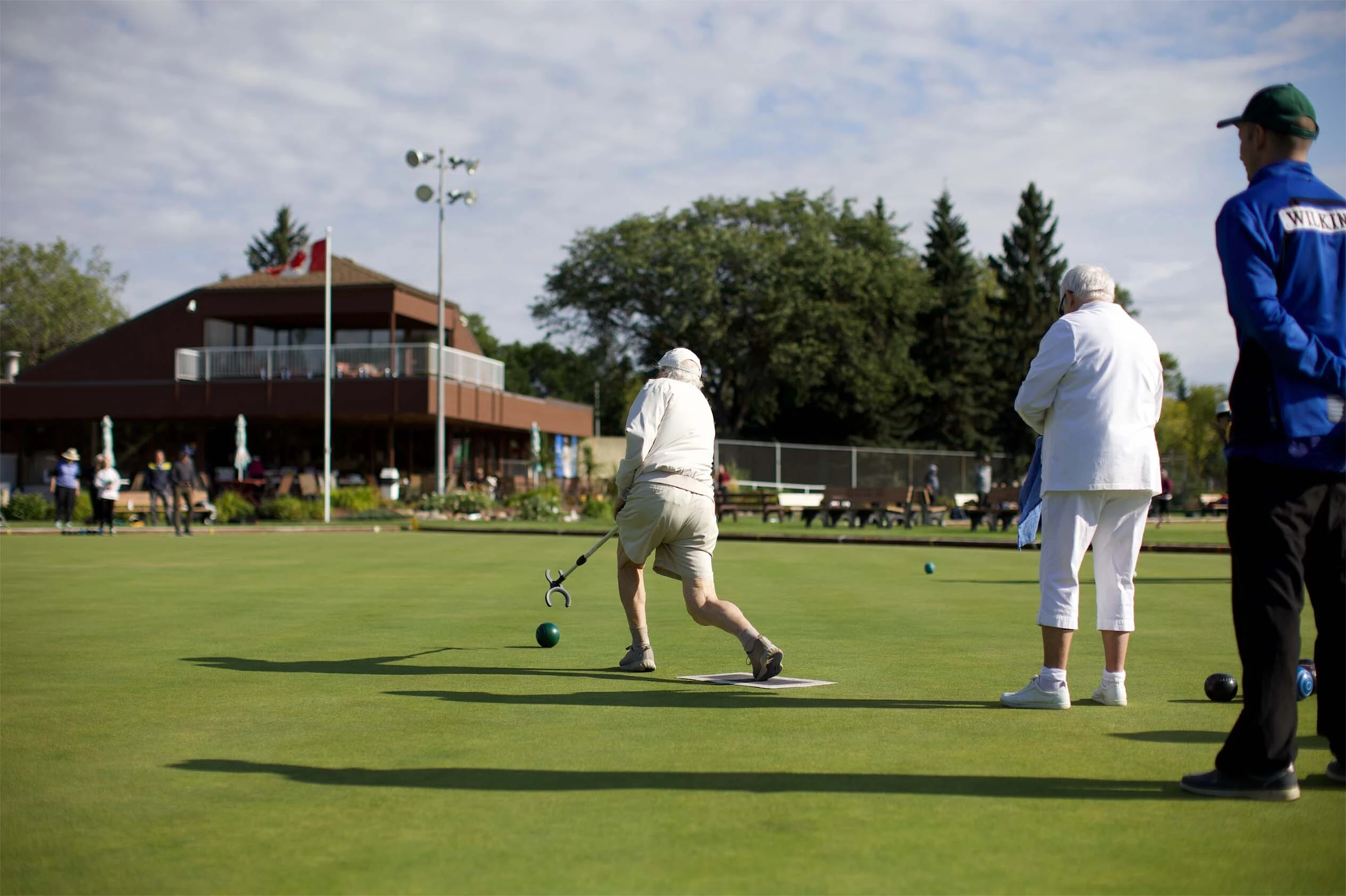 Some elderly citizens playing golf, a fun activity for seniors