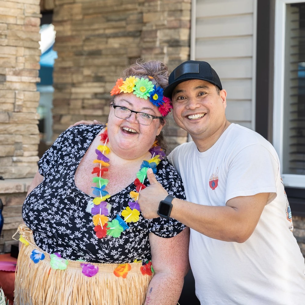 Staff at Wild Rose senior living community celebrating the Food Bank drive together.