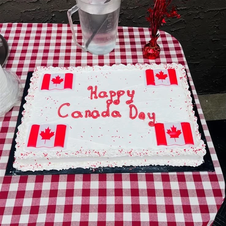 Cake with Happy Canada Day written on it