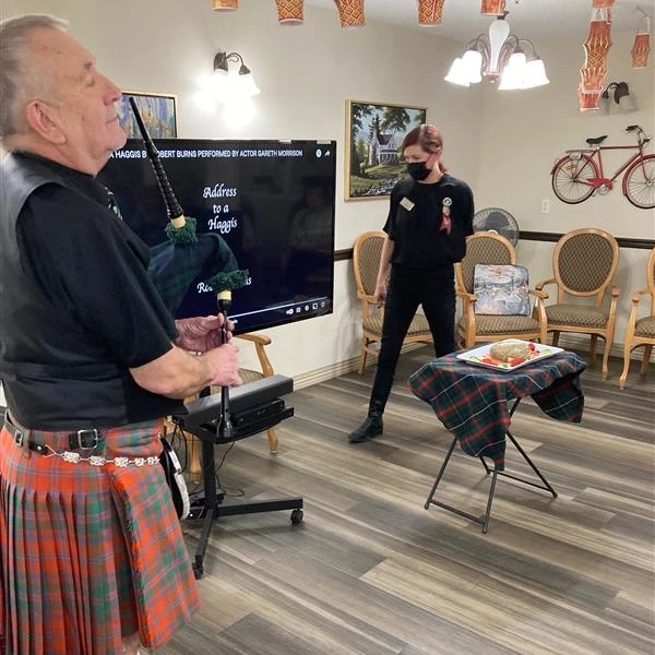 Man in kilt playing the bagpipes